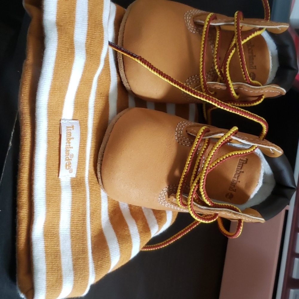 Brand new timberland booties and matching hat